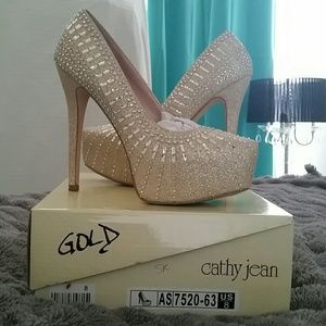 Gold stiletto heels with rhinestones